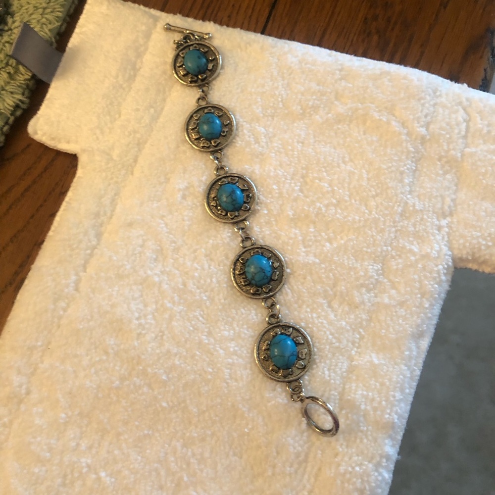 Stone silver bracelet.  Green stones.